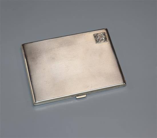 A George V engine turned silver cigarette case, Birmingham, 1930, 11.7cm.